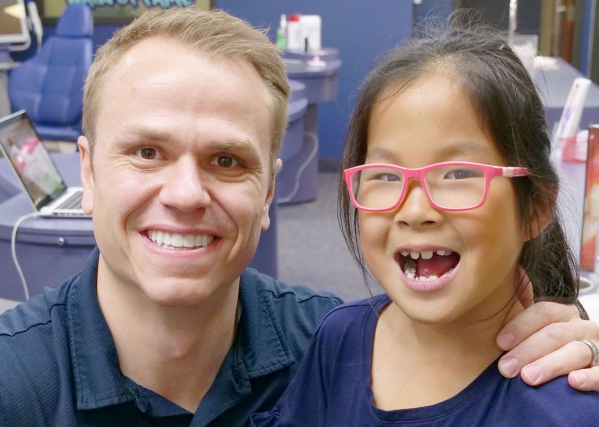 dr. shaw and young patient smiling