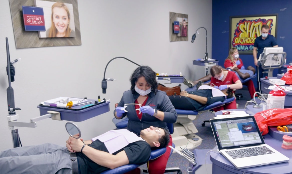 dr. shaw and young patient smiling